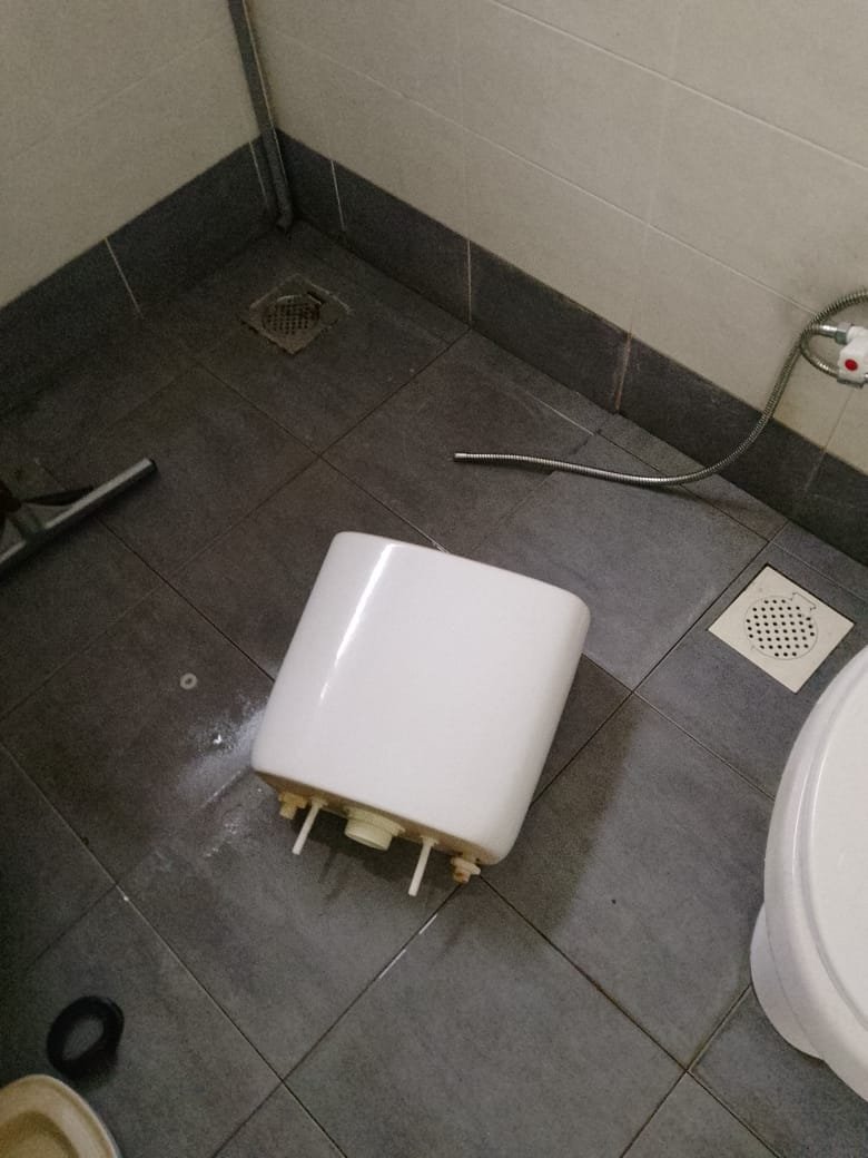 Toilet cistern removal and repair